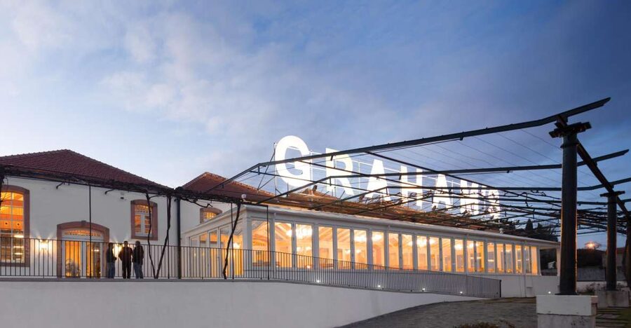 Porto: Graham's Port Lodge Tour & Vintage Room Wine Tasting - Walking among the oak pipes and vats