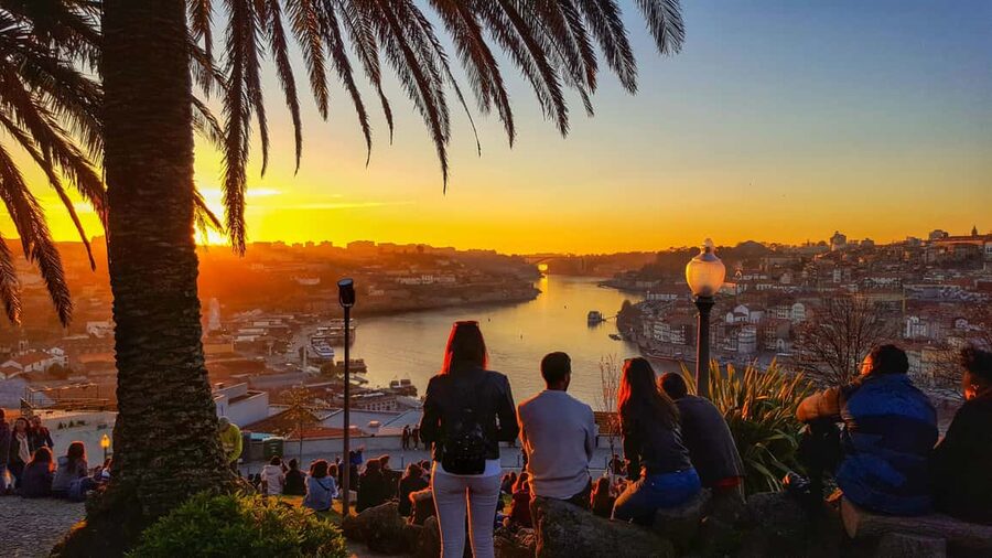 Porto: Sunset Walking Tour with Port Wine and Views - Sé Cathedral and the walk toward the bridge