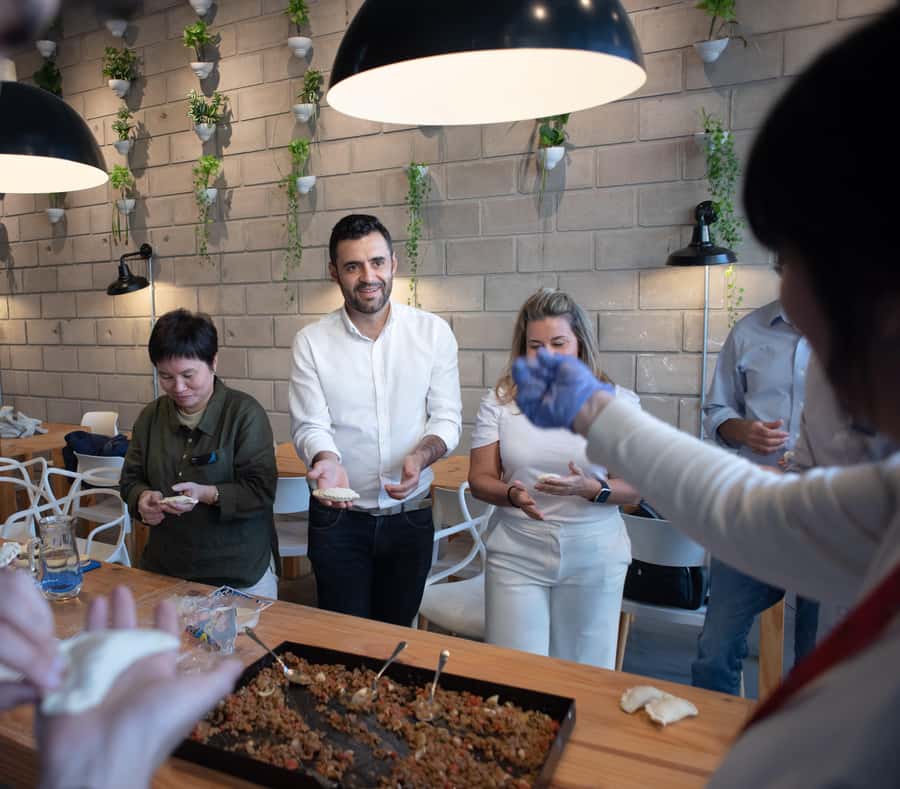 Premium Empanadas Cooking Class & Wine Tasting Experience - Making empanadas in Palermo