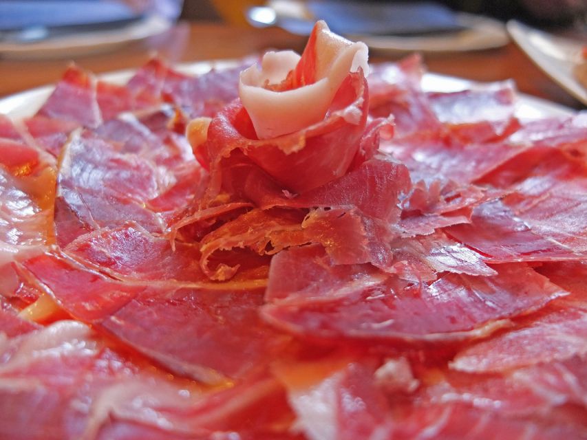 PREMIUM TAPAS TOUR: Paella, Market Tastings, and Winery - A short walk through central Málaga