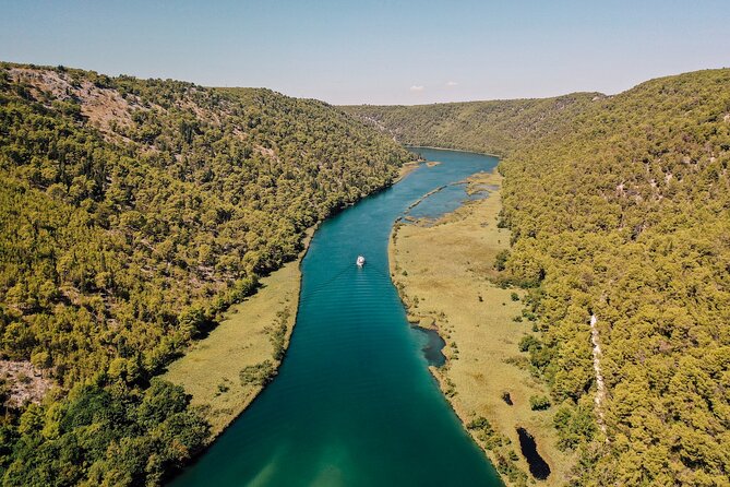 Private Full-Day Krka Waterfalls Tour with Wine Tasting - The boat ride into Skradin