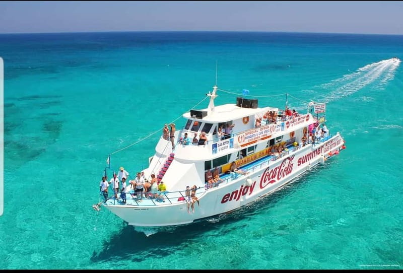 Protaras Blue Lagoon Sunset Tour with Pizza & Champagne - Key points to know before boarding