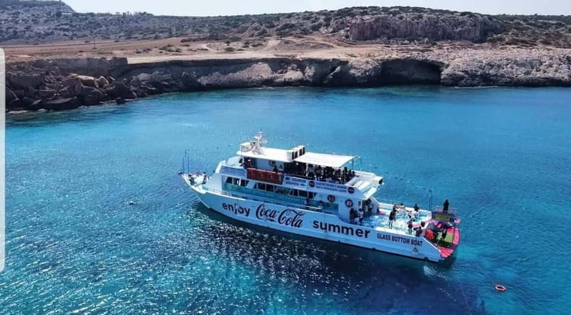 Protaras Blue Lagoon Sunset Tour with Pizza & Champagne - Champagne, pizza, fruit, and the return to Protaras