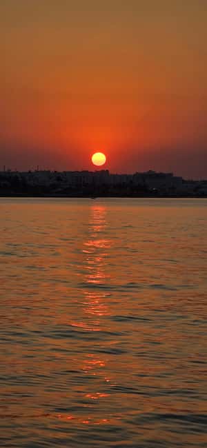 Protaras Blue Lagoon Sunset Tour with Pizza & Champagne - Should you book this sunset cruise?
