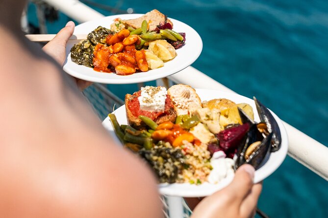 Rhodes Bay to Bay Swim Cruise-Greek Buffet w/wine included - Passing Ladiko Bay and Faliraki