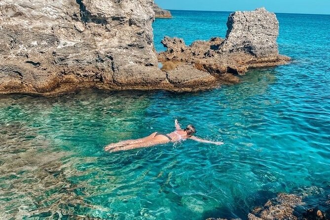 Rhodes Bay to Bay Swim Cruise-Greek Buffet w/wine included - Kallithea Springs and the mystery of the red water