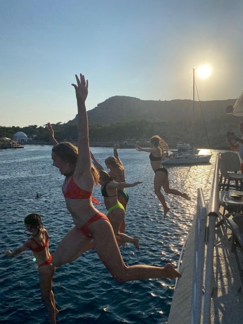 Rhodes: Bay to Bay Swim Cruise with Greek Buffet and Wine - Key details before you book