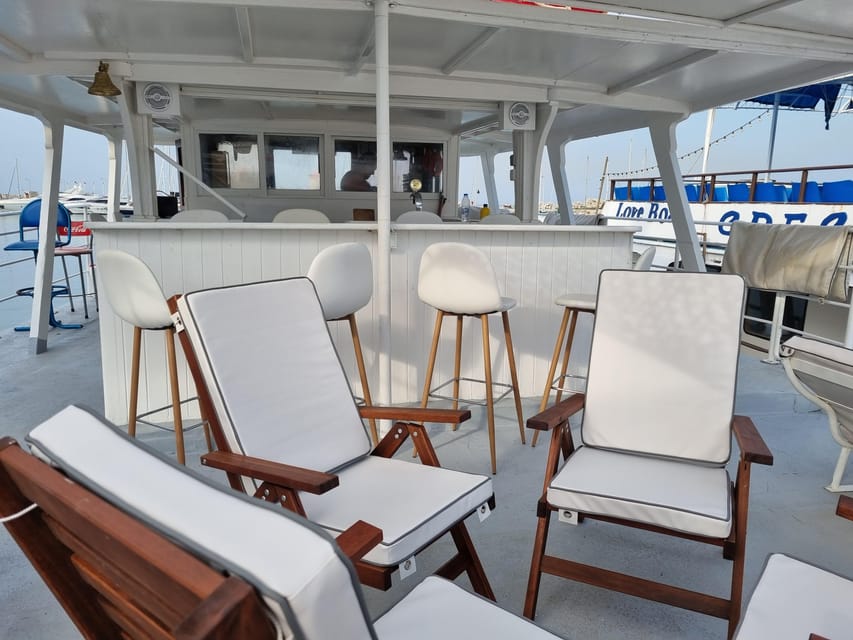 Rhodes: Sunset Cruise with Live Music, Wine & Greek Buffet - Key points to know before booking