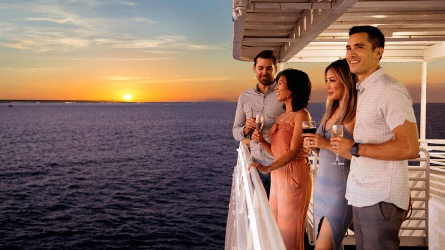 Rhodes: Sunset Cruise with Live Music, Wine & Greek Buffet - A sunset evening that starts with a swim