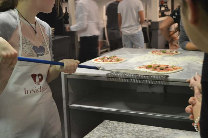 Rome: Hands-On Pizza Making Class near the Vatican with Wine - Mixing dough with an English-speaking chef
