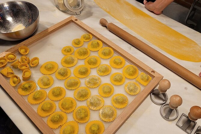 Rome Pasta Making Class with Italian Sauces and Wine Included - Eating what you made with wine and coffee