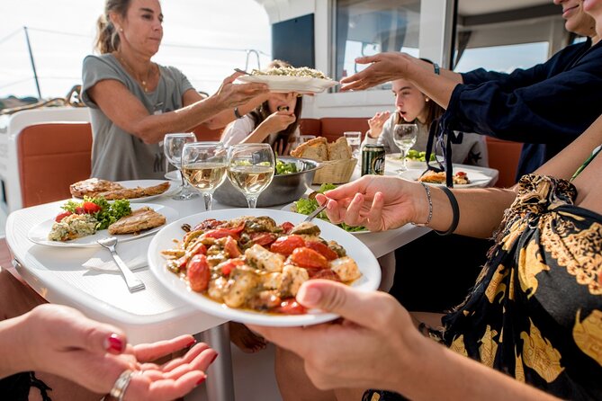 Sail the Athenian Coastline on a Catamaran with Meal & Wine - Second stop: the coastline around Vouliagmeni Bay