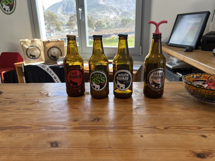 Santorini: Three Wineries and One Brewery Tour with Tastings - Transport, pickup, and group size