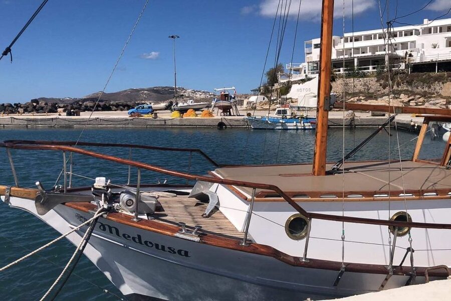 Santorini: Traditional Wooden Boat Tour with Meal and Wine - Thirassia Island and another chance to snorkel