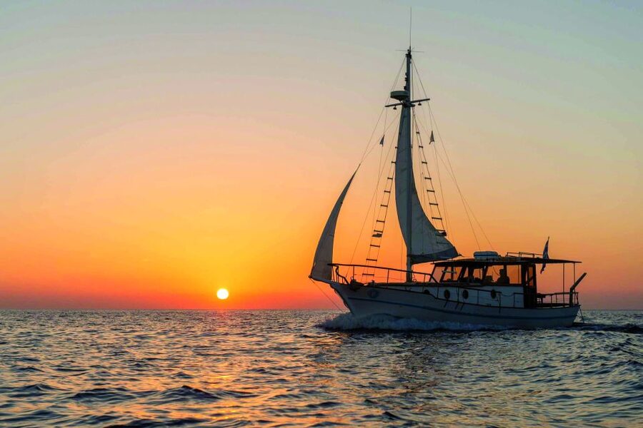 Santorini: Traditional Wooden Boat Tour with Meal and Wine - A generous Greek meal on board