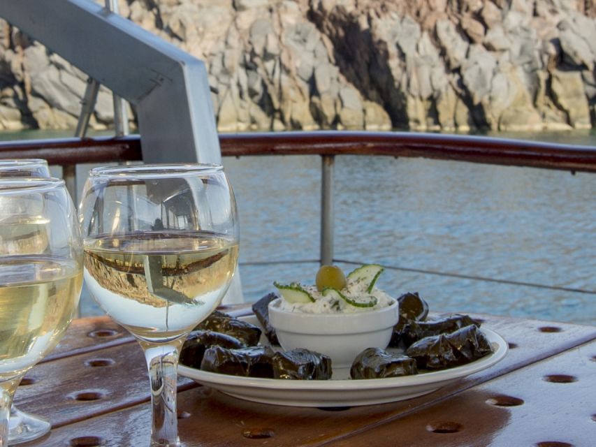 Santorini: Traditional Wooden Boat Tour with Meal and Wine - From your hotel to Vlychada port