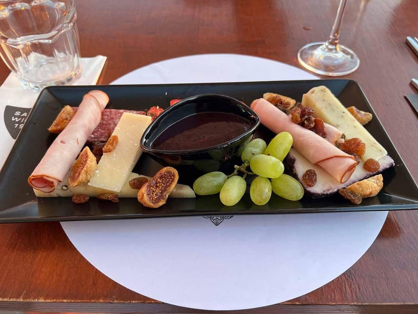 Santorini: Wine Tasting Tour with Snacks - Santo Winery delivers the big view