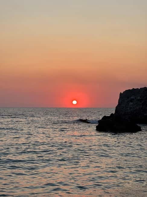 Sarandë: Sunset boat tour with local wine - The guide, music, and group atmosphere