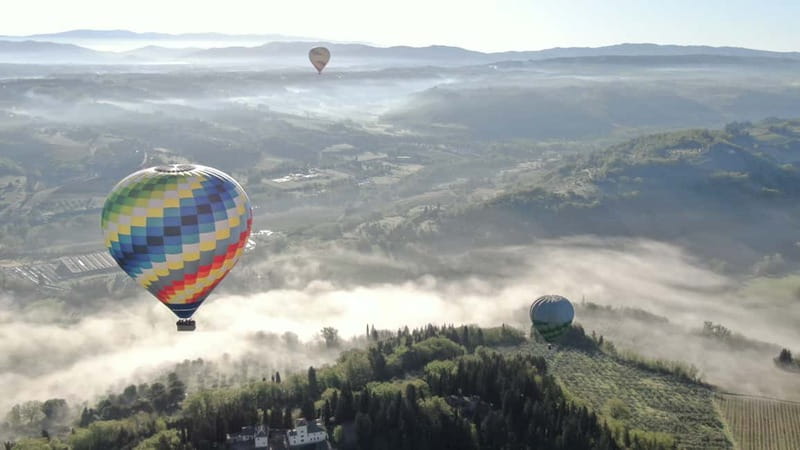 Siena: Balloon Flight Over Tuscany with a Glass of Wine - Floating above Siena and the Tuscan hills