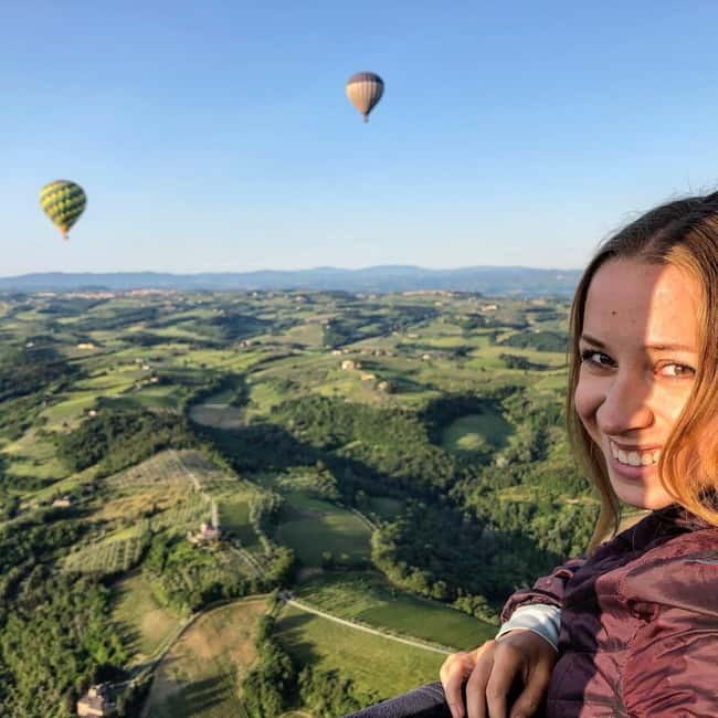 Siena: Balloon Flight Over Tuscany with a Glass of Wine - Preparing the balloon before takeoff