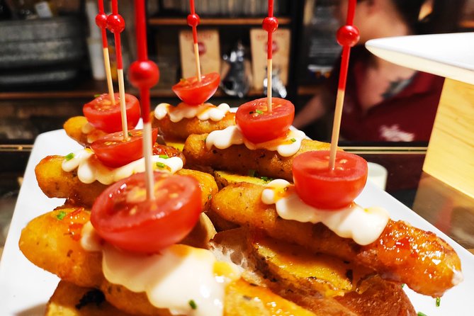 Spanish Wine and Tapas Tour in a Local Neighborhood in Barcelona - Four bars, four wine regions, and changing tapas