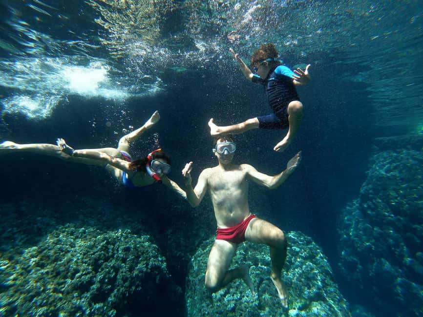Split: Blue Lagoon & 3 Island Cruise with Wine & Snorkeling - Blue Lagoon: clear water, busy setting
