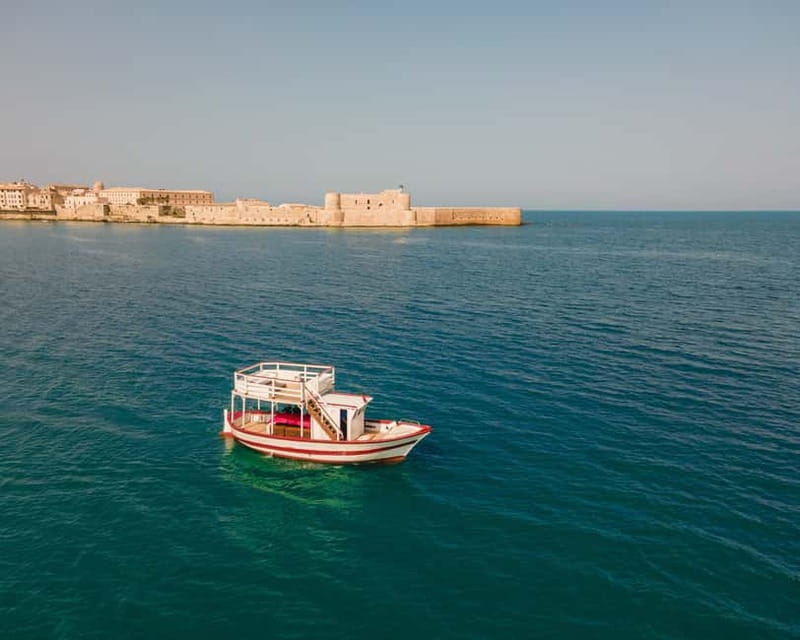 Syracuse: Boat Trip with Lunch, Wine, and Swimming Stops - Ortigia’s castles, walls, and waterfronts