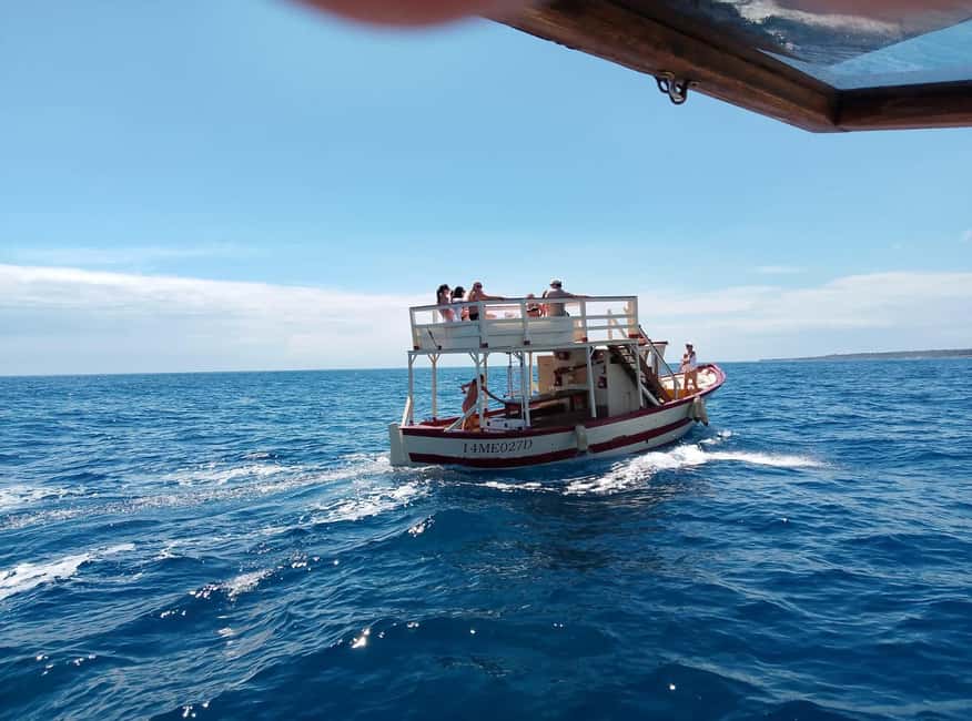 Syracuse: Boat Trip with Lunch, Wine, and Swimming Stops - A relaxed boat, not a speedboat thrill ride