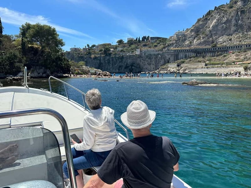 Taormina: Boat Tour with Sicilian Wine Tasting - Sicilian food and three wines on board