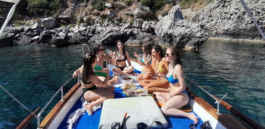 Taormina: Coastal Highlights Cruise with Wine & Food Tasting - What the three-hour itinerary feels like