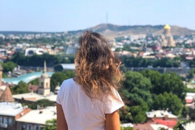 Tbilisi:Evening Walking & Talking Tour with Wine & Boat Ride - Freedom Square and the clock tower