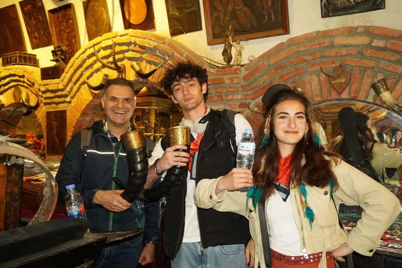 Tbilisi: Evening Walking Tour with Wine & Boat Ride Options - Peace Bridge after dark