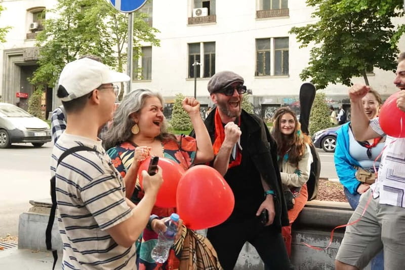 Tbilisi: Evening Walking Tour with Wine & Boat Ride Options - Rose Revolution Square and the Big Bicycle meeting point