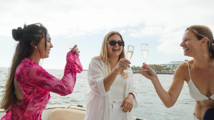 Tenerife: Shared Yacht Cruise with Champagne and Tapas - The return cruise and the view back toward Puerto Colon