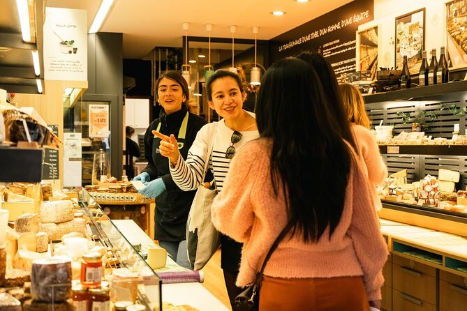 Traditional Gourmet Food & Wine Tour in Bordeaux - Porte Dijeaux adds a Roman and medieval note