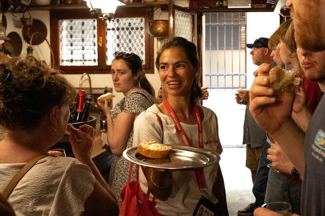 Venice Like a Local: Food, Wine & Spritz Tour with Traghetto Ride - Rialto Market, the bridge, and San Polo