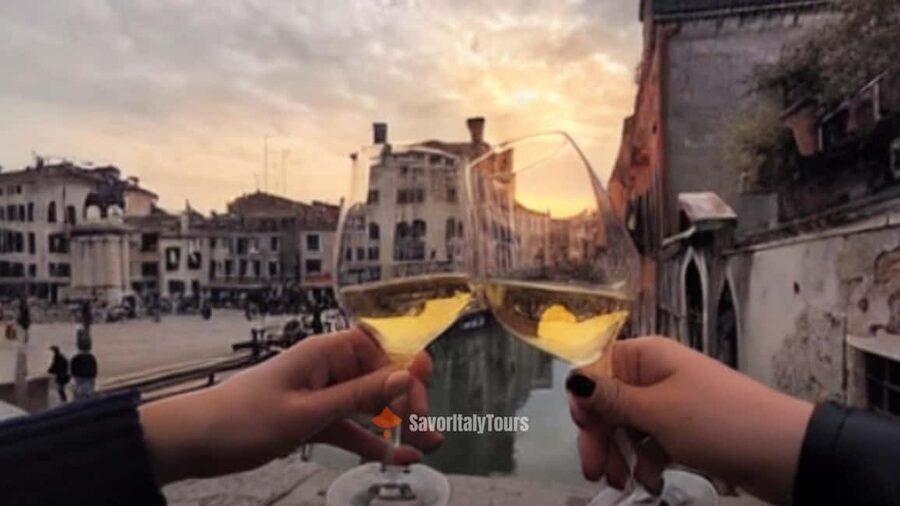 Venice: Sunset Walking Tour with Food and Wine Tastings - Meeting near the clock and setting off at sunset