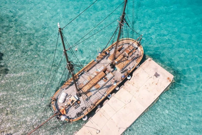 Zadar: Boat Tour with Unlimited Wine & 3 Stops - A wooden boat with a very different feel