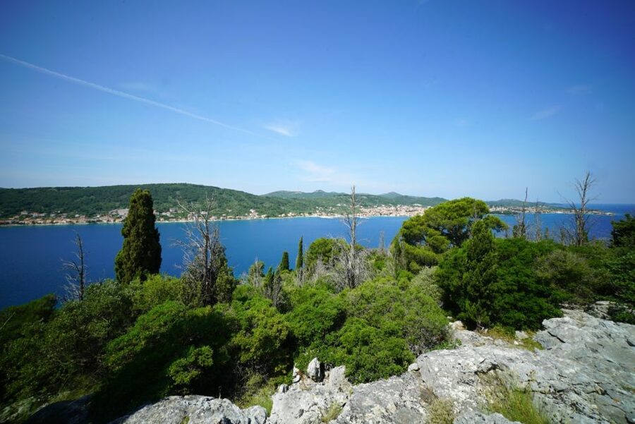 Zadar: Guided Speedboat Tour with Food, Oil & Wine Tasting - Preko on Ugljan: village streets and a turquoise bay