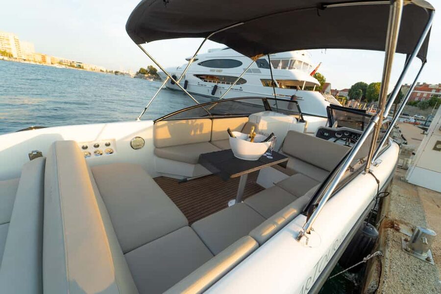 Zadar: Sunset and Night Cruise with Unlimited Sparkling Wine - Zadar Bridge under evening light