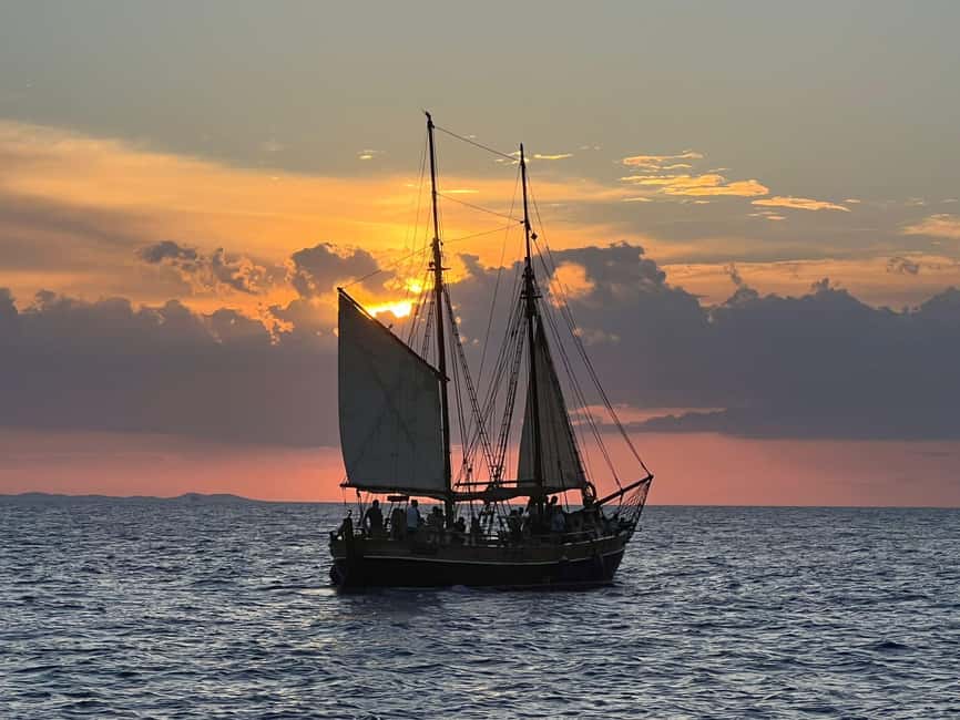 Zadar: Sunset Cruise on Traditional Boat with Wine - Boarding a 120-year-old wooden boat